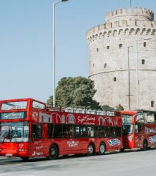image of a red bus in thessaloniki
